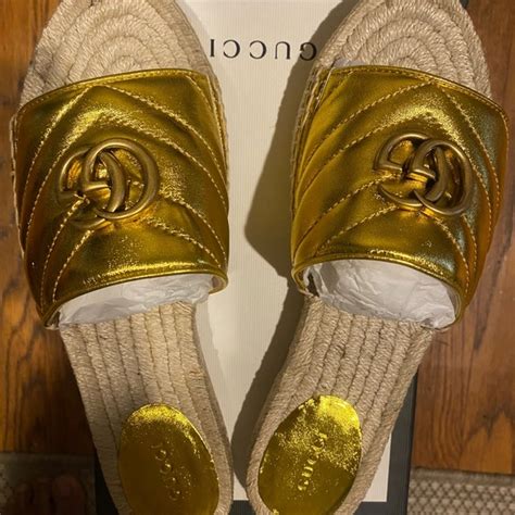 gucci slides with gold buckle